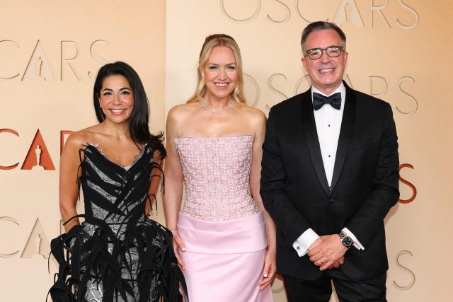 (L/R) Academy of Motion Picture Arts and Sciences Director Amy Homma, Academy of Motion Picture Arts and Sciences President US actress Howell Taylor and Academy of Motion Picture Arts and Sciences CEO Bill Kramer attend the 98th Annual Academy Awards at the Dolby Theatre in Hollywood, California on March 15, 2026. (Photo by ANGELA WEISS / AFP)