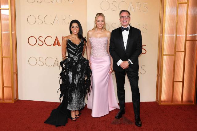 (L/R) Academy of Motion Picture Arts and Sciences Director Amy Homma, Academy of Motion Picture Arts and Sciences President US actress Howell Taylor and Academy of Motion Picture Arts and Sciences CEO Bill Kramer attend the 98th Annual Academy Awards at the Dolby Theatre in Hollywood, California on March 15, 2026. (Photo by ANGELA WEISS / AFP)