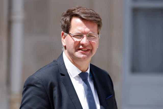 (FILES) France's Deputy Minister for Transports Patrice Vergriete leaves after the weekly cabinet meeting at the presidential Elysee Palace in Paris, on July 16, 2024. The former minister of Emmanuel Macron and Mayor of Dunkirk (Nord) was overwhelmingly re-elected on March 15, 2026 in the first round with 64.47% of the votes he announced on French TV network France 3. (Photo by Ludovic MARIN / AFP)