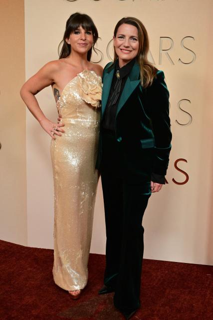 US author Megan Falley and US producer Stef Willen attend the 98th Annual Academy Awards at the Dolby Theatre in Hollywood, California on March 15, 2026. (Photo by Frederic J. Brown / AFP)