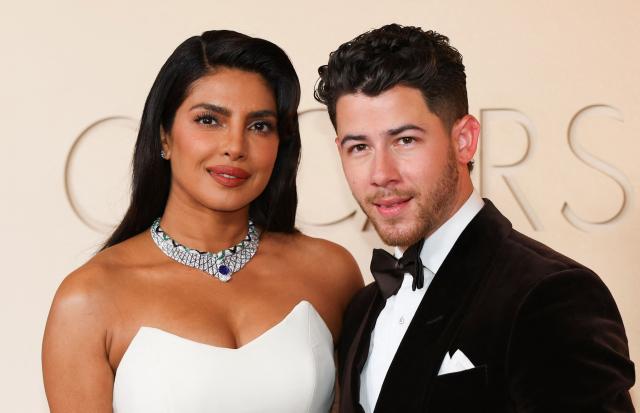 Indian actress, model Priyanka Chopra and US singer Nick Jonas attend the 98th Annual Academy Awards at the Dolby Theatre in Hollywood, California on March 15, 2026. (Photo by ANGELA WEISS / AFP)