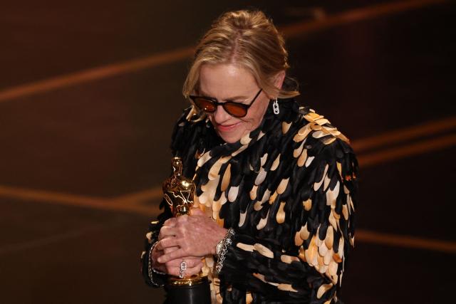 US actress Amy Madigan accepts the Oscar for Best Actress in a Supporting Role for "Weapons" onstage during the 98th Annual Academy Awards at the Dolby Theatre in Hollywood, California on March 15, 2026. (Photo by Patrick T. Fallon / AFP)