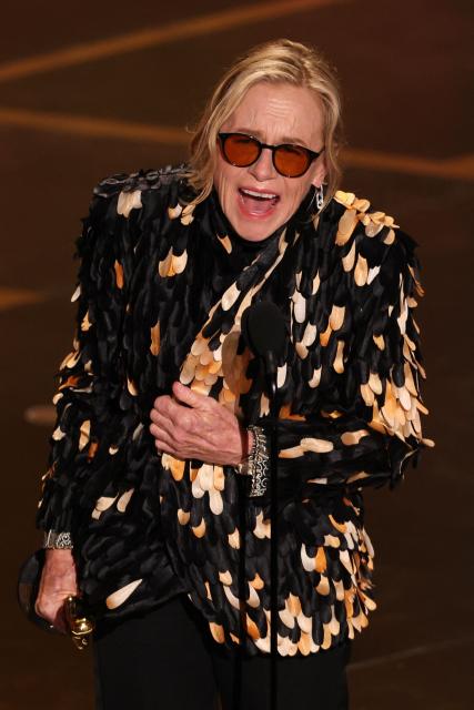 US actress Amy Madigan accepts the Oscar for Best Actress in a Supporting Role for "Weapons" onstage during the 98th Annual Academy Awards at the Dolby Theatre in Hollywood, California on March 15, 2026. (Photo by Patrick T. Fallon / AFP)