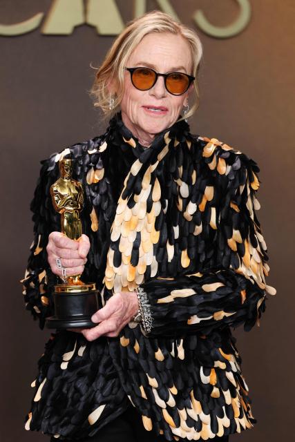 US actress Amy Madigan poses in the press room with the Oscar for Best Actress in a Supporting Role for "Weapons" during the 98th Annual Academy Awards at the Dolby Theatre in Hollywood, California on March 15, 2026. (Photo by VALERIE MACON / AFP)