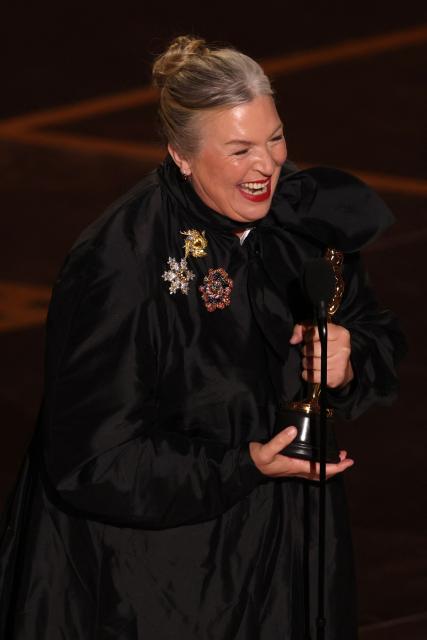 US costume designer Kate Hawley holds her Oscar for Best Costume Design for "Frankenstein" onstage during the 98th Annual Academy Awards at the Dolby Theatre in Hollywood, California on March 15, 2026. (Photo by Patrick T. Fallon / AFP)