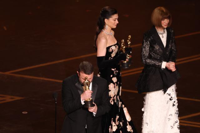 Hair and make-up artist Jordan Samuel holds the Oscar for Best Makeup and Hairstyling for "Frankenstein" during the 98th Annual Academy Awards at the Dolby Theatre in Hollywood, California on March 15, 2026. (Photo by Patrick T. Fallon / AFP)