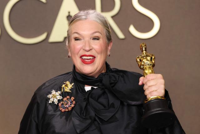 US costume designer Kate Hawley poses in the press room with her Oscar for Best Costume Design for "Frankenstein" during the 98th Annual Academy Awards at the Dolby Theatre in Hollywood, California on March 15, 2026. (Photo by VALERIE MACON / AFP)