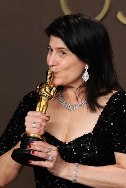 US casting director Cassandra Kulukundis poses in the press room with the Oscar for Best Casting for one "One Battle After Another" during the 98th Annual Academy Awards at the Dolby Theatre in Hollywood, California on March 15, 2026. (Photo by VALERIE MACON / AFP)