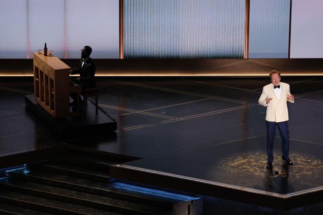 US actor Sterling K. Brown and US Comedian host Conan O'Brien perform onstage during the 98th Annual Academy Awards at the Dolby Theatre in Hollywood, California on March 15, 2026. (Photo by Patrick T. Fallon / AFP)