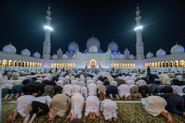 Muslims pray at the Sheikh Zayed Grand Mosque in Abu Dhabi in the early hours of March 16, 2026, on Laylat al-Qadr (Night of Destiny), one of the holiest nights during the Muslim fasting month of Ramadan. (Photo by Ryan Lim / AFP)