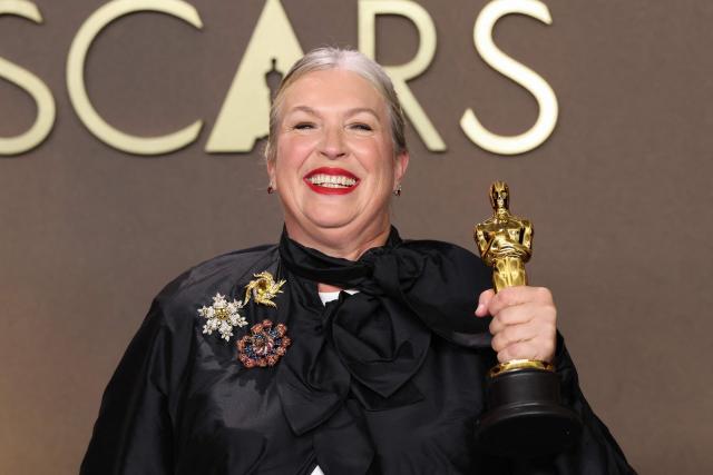 US costume designer Kate Hawley poses in the press room with her Oscar for Best Costume Design for "Frankenstein" during the 98th Annual Academy Awards at the Dolby Theatre in Hollywood, California on March 15, 2026. (Photo by VALERIE MACON / AFP)