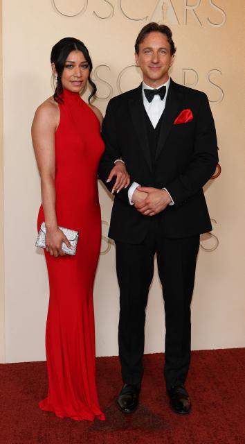 US makeup artist Glen Griffin(L) and a guest attend the 98th Annual Academy Awards at the Dolby Theatre in Hollywood, California on March 15, 2026. (Photo by ANGELA WEISS / AFP)