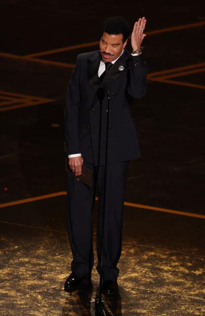 US singer-songwriter Lionel Richie presents the award for Best Music (Original Song) onstage during the 98th Annual Academy Awards at the Dolby Theatre in Hollywood, California on March 15, 2026. (Photo by Patrick T. Fallon / AFP)