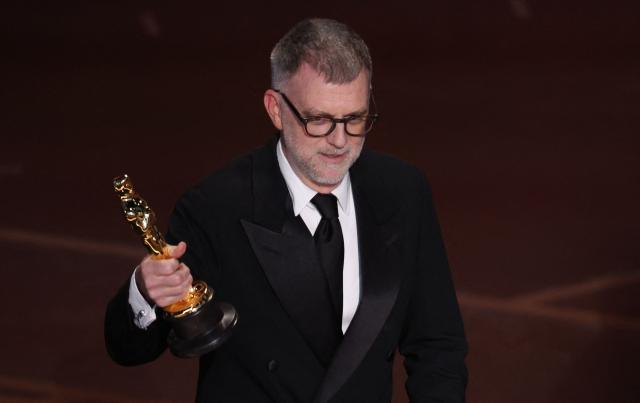 TOPSHOT - US director Paul Thomas Anderson accepts the award for Best Director for "One Battle After Another" onstage during the 98th Annual Academy Awards at the Dolby Theatre in Hollywood, California on March 15, 2026. (Photo by Patrick T. Fallon / AFP)