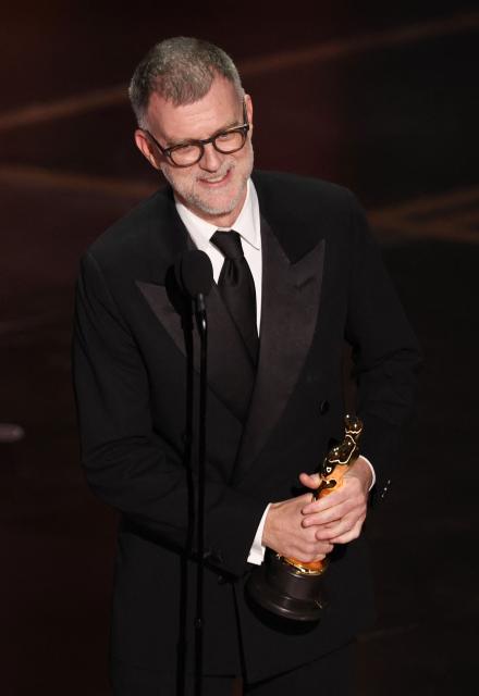 US director Paul Thomas Anderson accepts the award for Best Director for "One Battle After Another" onstage during the 98th Annual Academy Awards at the Dolby Theatre in Hollywood, California on March 15, 2026. (Photo by Patrick T. Fallon / AFP)