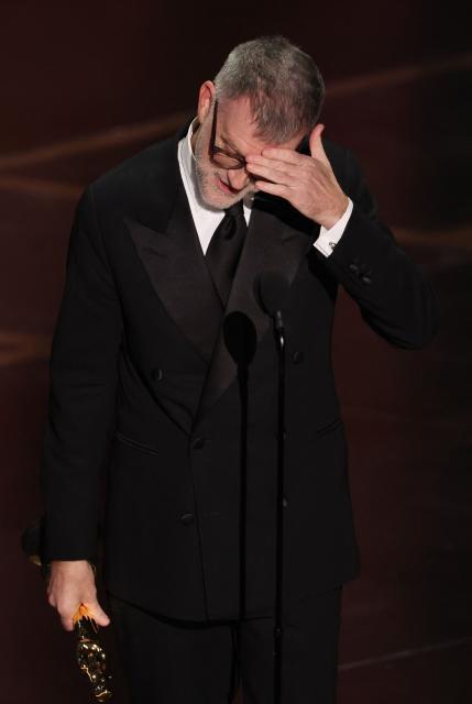 US director Paul Thomas Anderson accepts the award for Best Director for "One Battle After Another" onstage during the 98th Annual Academy Awards at the Dolby Theatre in Hollywood, California on March 15, 2026. (Photo by Patrick T. Fallon / AFP)
