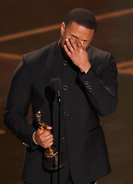 US actor Michael B. Jordan accepts the award for Best Actor in a Leading Role for "Sinners" onstage during the 98th Annual Academy Awards at the Dolby Theatre in Hollywood, California on March 15, 2026. (Photo by Patrick T. Fallon / AFP)