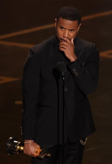US actor Michael B. Jordan accepts the award for Best Actor in a Leading Role for "Sinners" onstage during the 98th Annual Academy Awards at the Dolby Theatre in Hollywood, California on March 15, 2026. (Photo by Patrick T. Fallon / AFP)