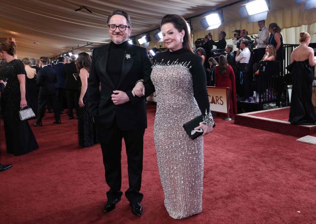 US actress Melissa Mccarthy and her guest attend the 98th Annual Academy Awards at the Dolby Theatre in Hollywood, California on March 15, 2026. (Photo by VALERIE MACON / AFP)