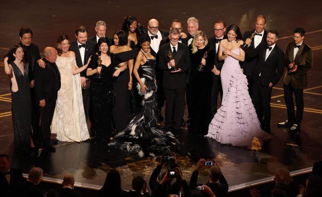 US filmmaker Paul Thomas Anderson and US producer Sara Murphy accept the award for Best Picture for "One Battle After Another" alongside cast and crew onstage during the 98th Annual Academy Awards at the Dolby Theatre in Hollywood, California on March 15, 2026. (Photo by Patrick T. Fallon / AFP)