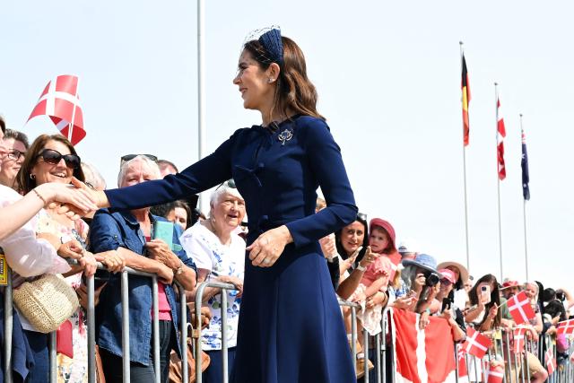 Denmark's Queen Mary meets with members the public during a visit to the Australian War Memorial in Canberra on March 16, 2026. (Photo by LUKAS COCH / POOL / AFP)