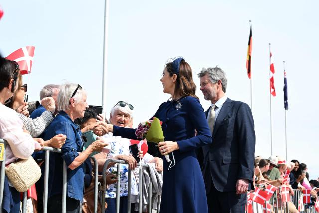 Denmark's King Frederik X and Queen Mary meet with the public during a visit to the Australian War Memorial in Canberra on March 16, 2026. (Photo by LUKAS COCH / POOL / AFP)