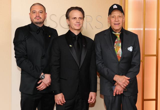 (L-R) Colombian-US documentary filmmaker Juan Arredondo, US documentary filmmaker Craig Renaud and US journalist and documentary filmmaker Jon Alpert attend the 98th Annual Academy Awards at the Dolby Theatre in Hollywood, California on March 15, 2026. (Photo by ANGELA WEISS / AFP)