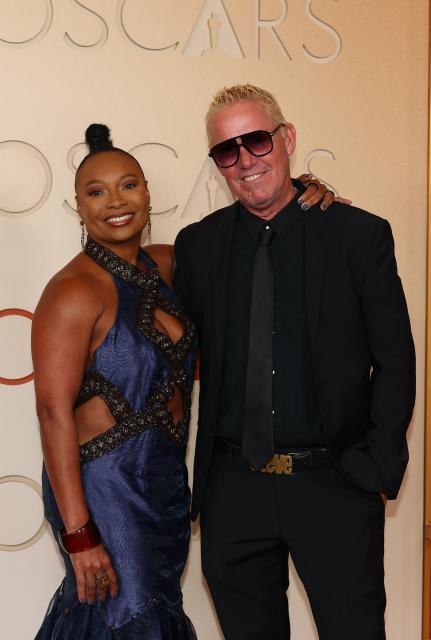 US film sound designer Steve Boeddeker (R) and Dionne Holder attend the 98th Annual Academy Awards at the Dolby Theatre in Hollywood, California on March 15, 2026. (Photo by ANGELA WEISS / AFP)