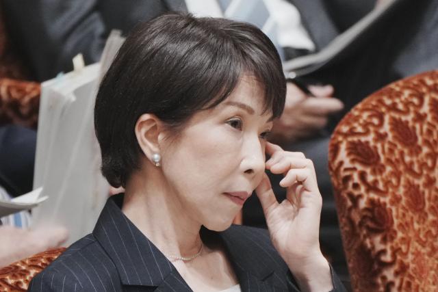 Japan's Prime Minister Sanae Takaichi listens to questions at a budget committee session of the House of Councillors in Parliament in Tokyo on March 16, 2026. (Photo by Kazuhiro NOGI / AFP)