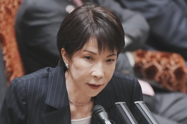 Japan's Prime Minister Sanae Takaichi answers questions at a budget committee session of the House of Councillors in Parliament in Tokyo on March 16, 2026. (Photo by Kazuhiro NOGI / AFP)