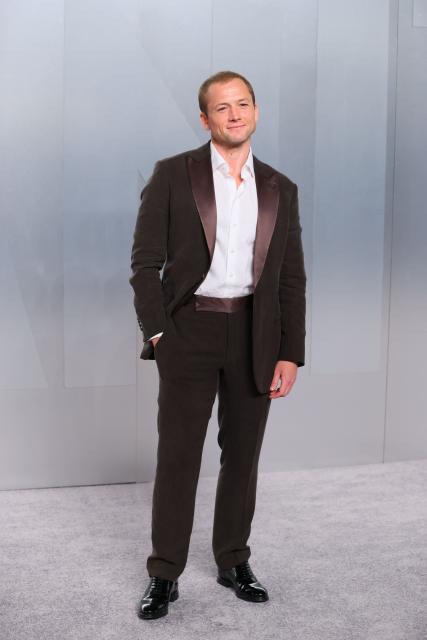 British actor and singer Taron Egerton attends the Vanity Fair Oscar Party at the Los Angeles County Museum of Art (LACMA) in Los Angeles on March 15, 2026. (Photo by Jean Baptiste Lacroix / AFP)