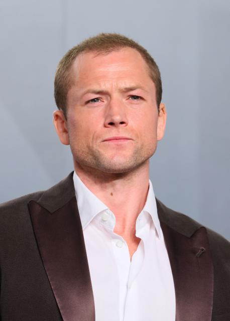 British actor and singer Taron Egerton attends the Vanity Fair Oscar Party at the Los Angeles County Museum of Art (LACMA) in Los Angeles on March 15, 2026. (Photo by Jean Baptiste Lacroix / AFP)