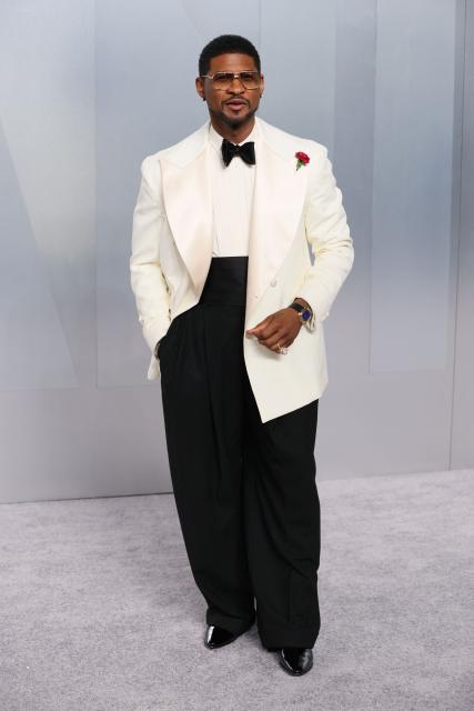 US singer Usher attends the Vanity Fair Oscar Party at the Los Angeles County Museum of Art (LACMA) in Los Angeles on March 15, 2026. (Photo by Jean Baptiste Lacroix / AFP)