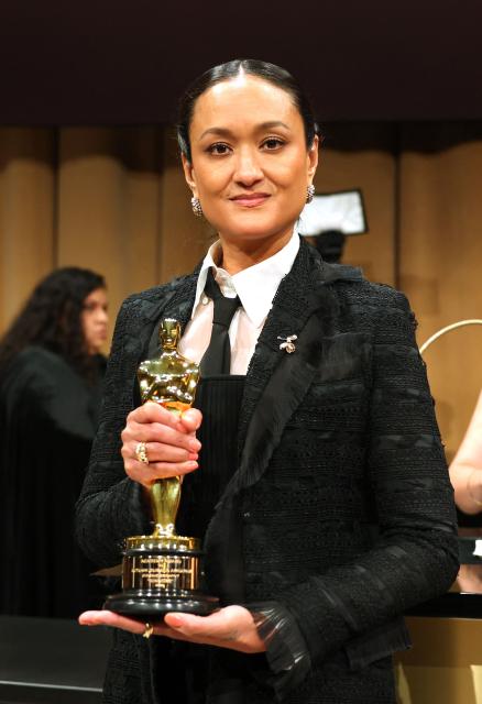 US cinematographer Autumn Durald Arkapaw holds her award for her work on "Sinners" at the 98th Annual Academy Awards Governors Ball at the Dolby Theatre in Hollywood, California on March 15, 2026. (Photo by ANGELA WEISS / AFP)