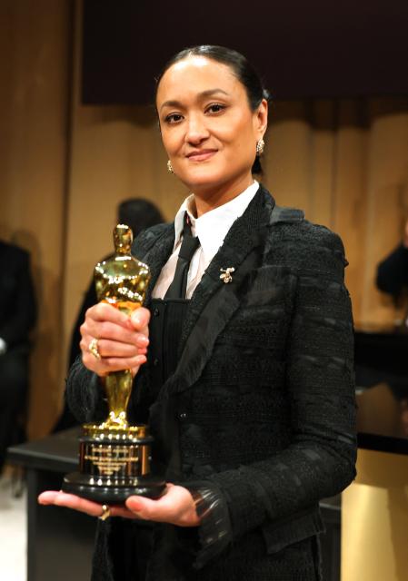 US cinematographer Autumn Durald Arkapaw holds her award for her work on "Sinners" at the 98th Annual Academy Awards Governors Ball at the Dolby Theatre in Hollywood, California on March 15, 2026. (Photo by ANGELA WEISS / AFP)
