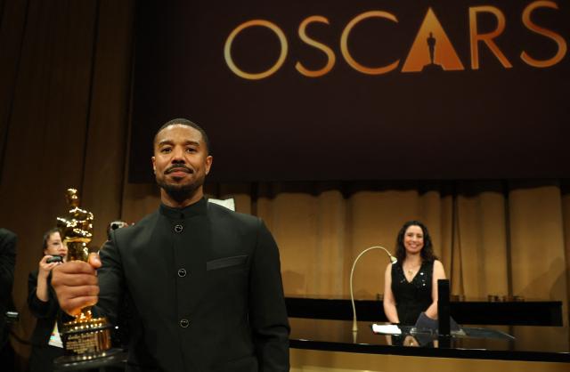 US actor Michael B. Jordan holds his Oscar for Best Actor in a Leading Role for "Sinners" as he attends the 98th Annual Academy Awards Governors Ball at the Dolby Theatre in Hollywood, California on March 15, 2026. (Photo by ANGELA WEISS / AFP)