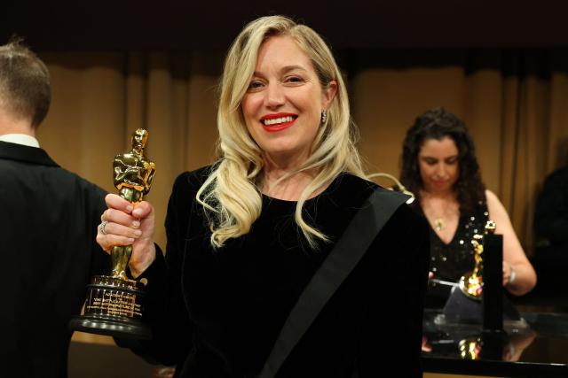 US producer Sara Murphy holds her Oscar for Best Picture for "One Battle After Another" as she attends the 98th Annual Academy Awards Governors Ball at the Dolby Theatre in Hollywood, California on March 15, 2026. (Photo by ANGELA WEISS / AFP)