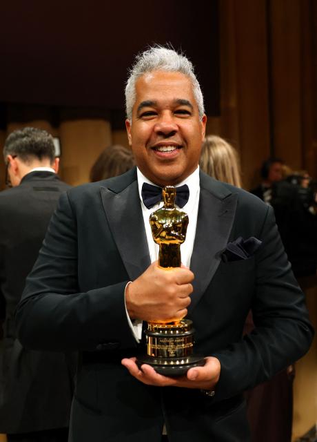 US sound mixer Juan Peralta stands with his award for Best Sound for "F1" during the 98th Annual Academy Awards Governors Ball at the Dolby Theatre in Hollywood, California on March 15, 2026. (Photo by ANGELA WEISS / AFP)