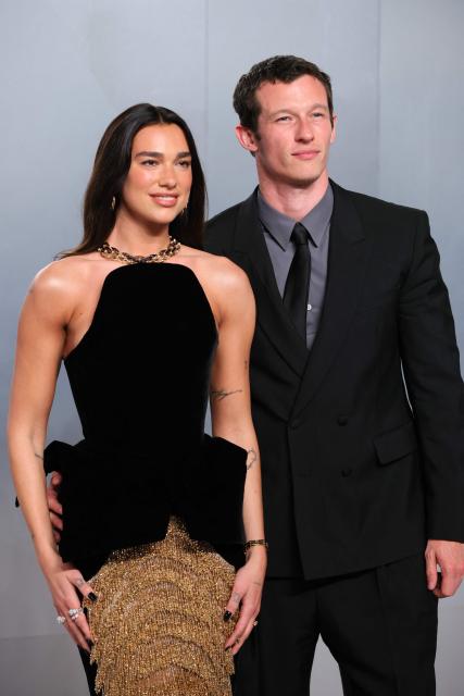 English singer and songwriter Dua Lipa and British actor Callum Turner attends the Vanity Fair Oscar Party at the Los Angeles County Museum of Art (LACMA) in Los Angeles on March 15, 2026. (Photo by Jean Baptiste Lacroix / AFP)