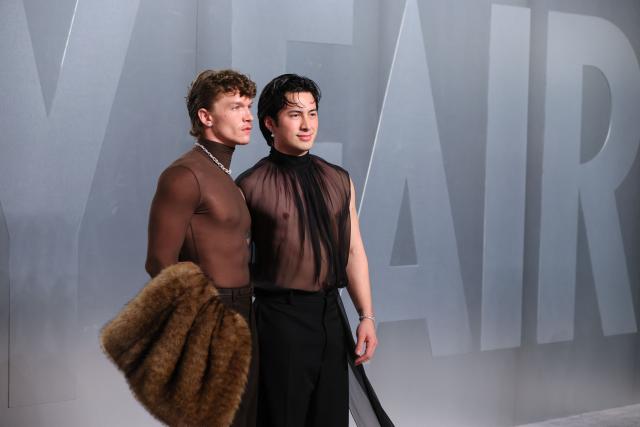 US actor Connor Storrie and US actor Hudson Williams attends the Vanity Fair Oscar Party at the Los Angeles County Museum of Art (LACMA) in Los Angeles on March 15, 2026. (Photo by Jean Baptiste Lacroix / AFP)