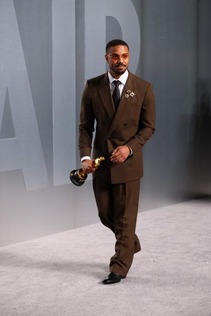 US actor Michael B. Jordan US actor Michael B. Jordan holds the Oscar for Best Actor in a Leading Role for "Sinners" as he attends the Vanity Fair Oscar Party at the Los Angeles County Museum of Art (LACMA) in Los Angeles on March 15, 2026. (Photo by Jean Baptiste Lacroix / AFP)