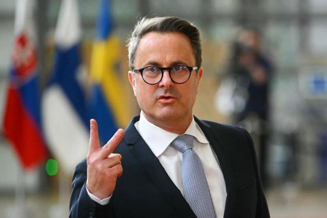 Luxembourg's Foreign Minister Xavier Bettel gestures as he arrives for a Foreign Affairs Council to discuss Russia’s war of aggression against Ukraine and the situation in the Middle East, in Brussels on March 16, 2026. (Photo by NICOLAS TUCAT / AFP)