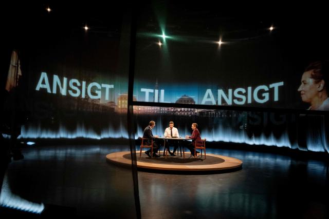 Denmark's Prime Minister and top candidate of the Social Democrat Party, Mette Frederiksen and Denmark's Defense Minister and top candidate of Denmark's Liberal Party Venstre, Troels Lund Poulsen attend the debate "Face to Face - Who should lead Denmark?" hosted by Kaare Quist in DR Byen in Copenhagen, Denmark on March 15, 2026. The Danish parliamentary election will be held on March 24, 2026. (Photo by Mads Claus Rasmussen / Ritzau Scanpix / AFP) / Denmark OUT