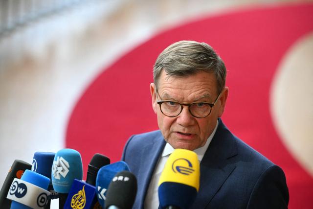 Germany's Foreign Minister Johann Wadephul speaks to the media as he arrives for a Foreign Affairs Council to discuss Russia’s war of aggression against Ukraine and the situation in the Middle East, in Brussels on March 16, 2026. (Photo by NICOLAS TUCAT / AFP)