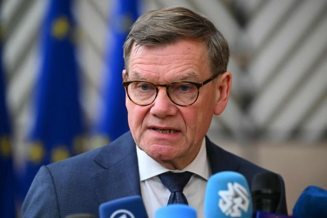 Germany's Foreign Minister Johann Wadephul speaks to the media as he arrives for a Foreign Affairs Council to discuss Russia’s war of aggression against Ukraine and the situation in the Middle East, in Brussels on March 16, 2026. (Photo by NICOLAS TUCAT / AFP)