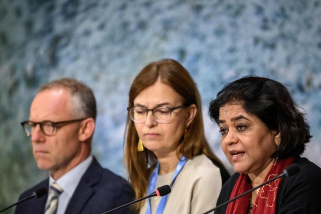 Chair of the United Nations' Independent International Iran Fact-Finding Mission Sara Hossain (R) delivers her speeh next to mission members Max du Plessis (L) and Viviana Krsticevic (C) at the UN Human Rights Council on March 16, 2026. (Photo by Fabrice COFFRINI / AFP)