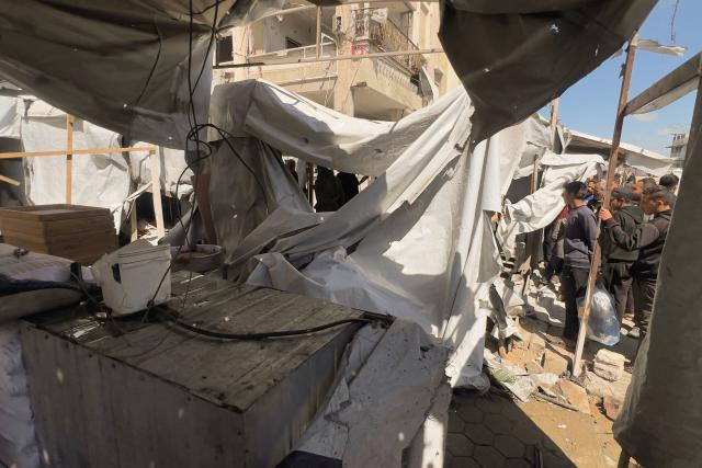 Displaced Palestinians inspect the site targeted by Israeli warplanes, in the Jabalia refugee camp in the northern Gaza Strip on March 16, 2026. Gaza's health ministry, which operates under Hamas authority, says at least 663 Palestinians have been killed since the start of the truce October 10, 2025. The Israeli military says at least five of its soldiers have been killed in the same period since October 10. (Photo by Bashar Taleb / AFP)