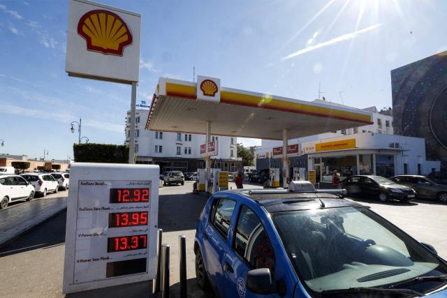 Fuel prices are displayed at a petrol station in Rabat on March 16, 2026, as prices hiked up in Morocco amid geopolitical tensions in the Middle East disrupting the global oil market. (Photo by Abdel Majid BZIOUAT / AFP)