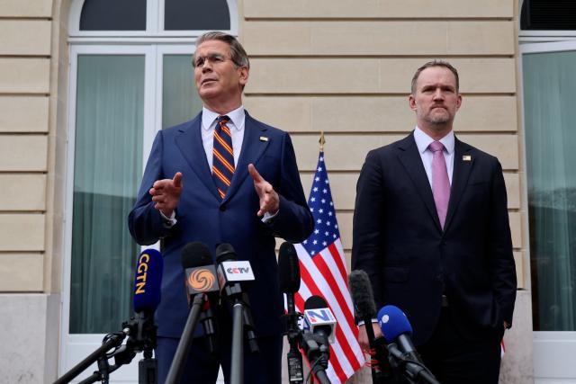 US Treasury Secretary Scott Bessent (L) addresses journalists next to US Trade Representative Jamieson Greer following a new round of trade discussions with Chinese officials at the OECD Headquarters in Paris on March 16, 2026. China and the United States agreed that stable bilateral economic trade relations were beneficial to both countries and the world, China's International Trade Representative told reporters. (Photo by Ludovic MARIN / AFP)