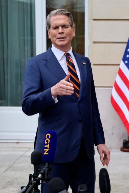 US Treasury Secretary Scott Bessent addresses journalists during a press statement with US Trade Representative Jamieson Greer (unseen) following a new round of trade discussions with Chinese officials at the OECD Headquarters in Paris on March 16, 2026. China and the United States agreed that stable bilateral economic trade relations were beneficial to both countries and the world, China's International Trade Representative told reporters. (Photo by Ludovic MARIN / AFP)
